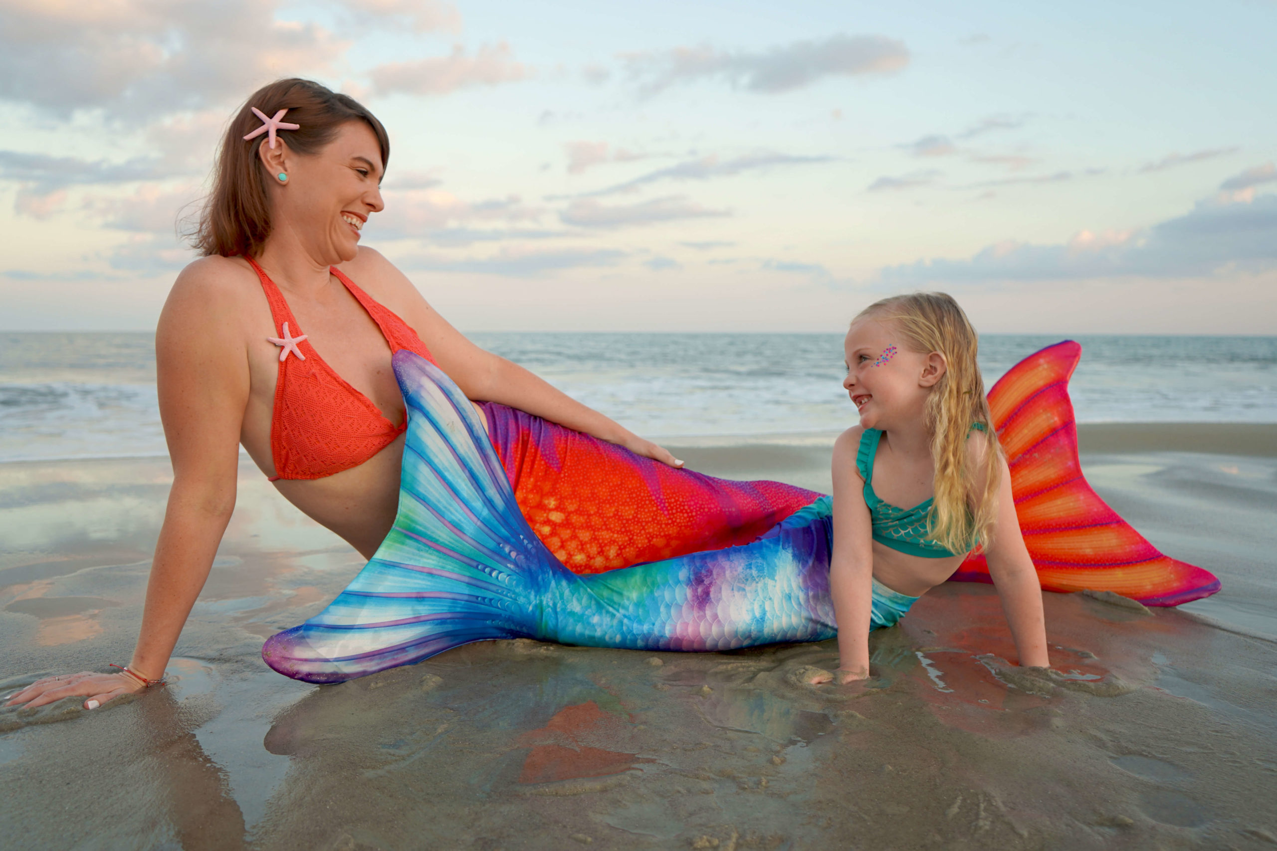 mother daughter dressed as mermaids